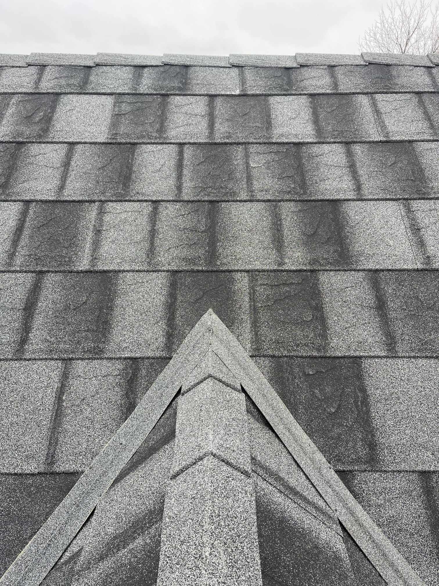 Metstar Slate stone coated metal roof shingles on a roof in Peterborough Ontario